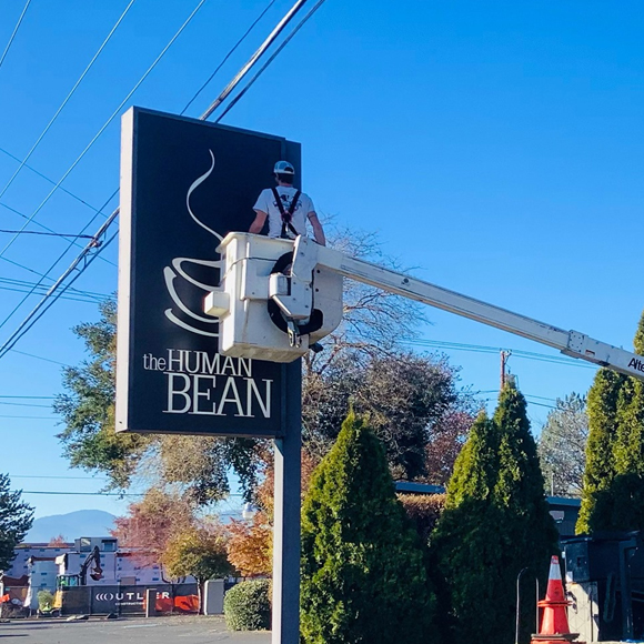 The Human Bean pylon sign